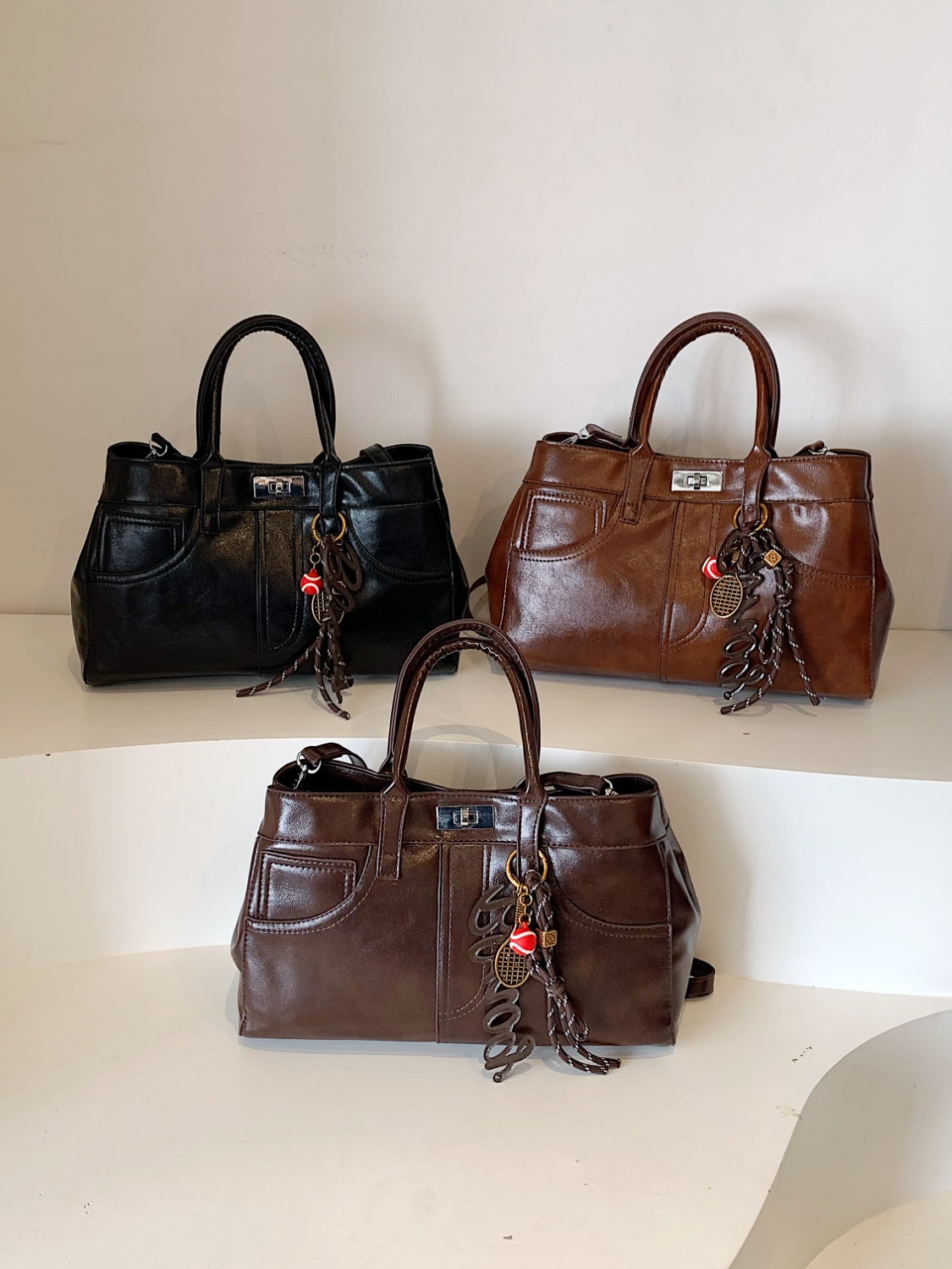 Leather Handbag with Pendant